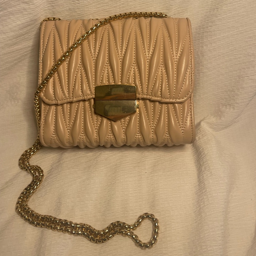 Pink and gold purse